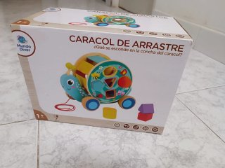 Juguete de madera caracol clasificador formas