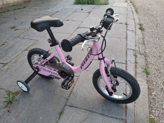 Bicicleta infantil 12" rosa con ruedines
