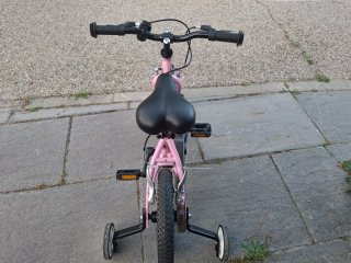 Bicicleta infantil 12" rosa con ruedines