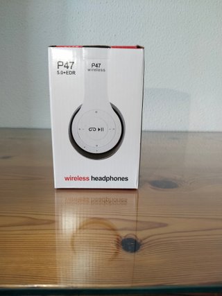 Auriculares Bluetooth nuevos con cable de carga