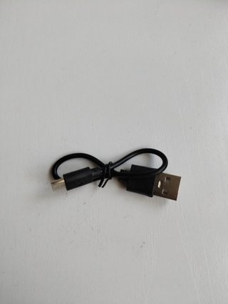 Auriculares Bluetooth nuevos con cable de carga