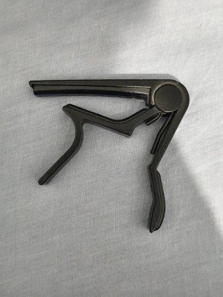 Capo para guitarra