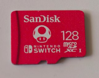 Nintendo Switch OLED Blanca con varios accesorios