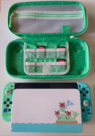 Nintendo Switch OLED Blanca con varios accesorios