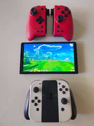 Nintendo Switch OLED Blanca con varios accesorios