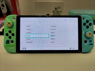 Nintendo Switch OLED Blanca con varios accesorios