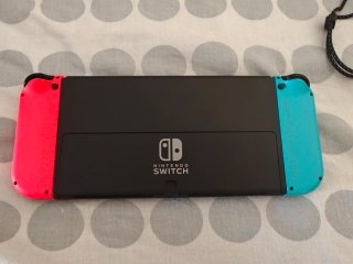 Nintendo Switch OLED + Funda Protectora