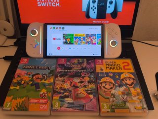 Nintendo Switch OLED + 3 Juegos + Joy pad controll