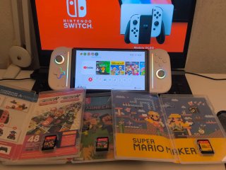 Nintendo Switch OLED + 3 Juegos + Joy pad controll