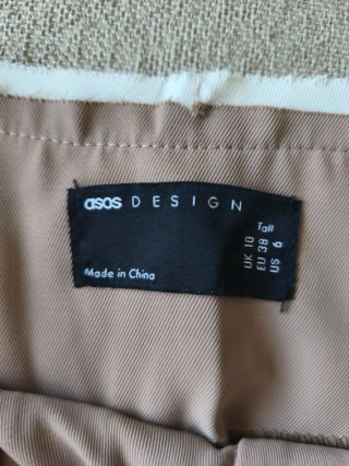 Pantalón traje cintura despuntada beige