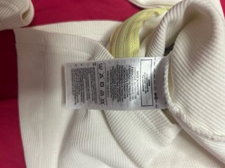 Top Reebok blanco con cremallera