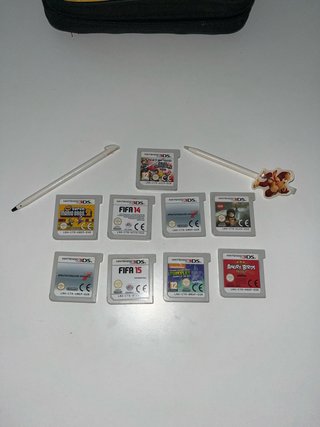 Nintendo 3DS XL Blanca + cargador + 9 juegos.