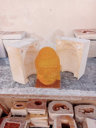 Cabeza de Buda naranja