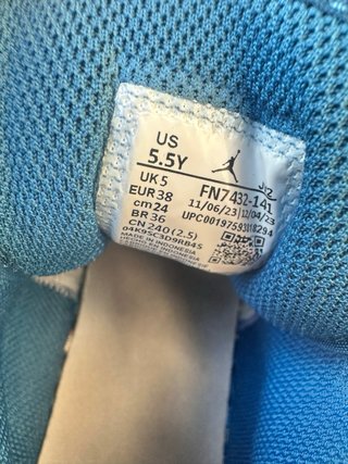 Nike Air Jordan 1 Mid Blancas y Azules