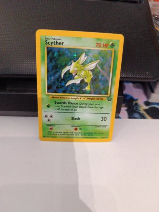 Carta Pokémon Scyther. 10/64