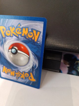 Carta Pokémon Scyther. 10/64
