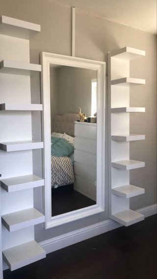 Espejo de pared IKEA TOFTBYN con marco blanco