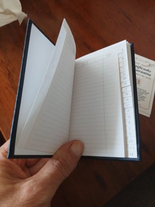 Agenda telefónica de plata con certificado