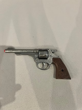 Pistola de juguete con 96 tiros + 16 extras