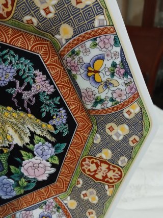 Plato decorativo pavo real porcelana