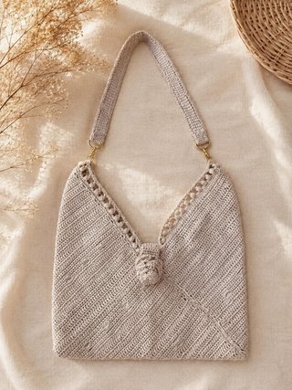 Bolso tejido a mano beige
