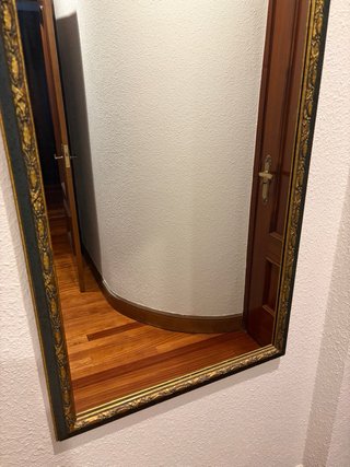 Espejo decorativo dorado y negro