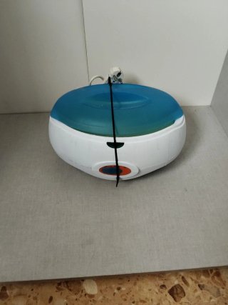 Calentador de parafina blanco y azul