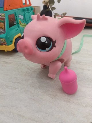 No envío Cerdo rosa de juguete con biberón