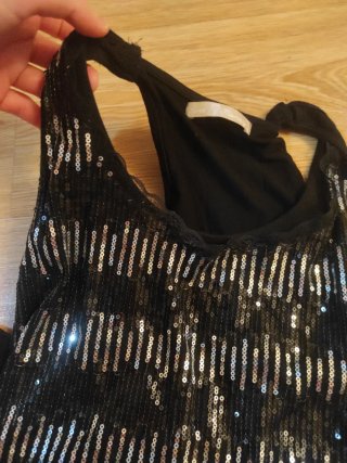 Camiseta lentejuelas negra y plateada
