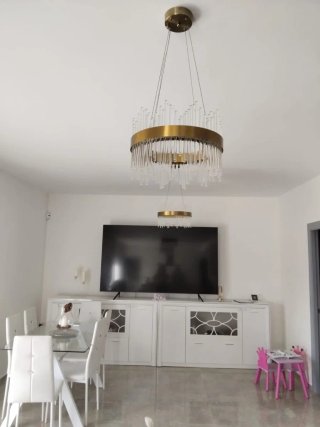 Lámpara de diseño colgante dorada y cristal