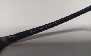 Gafas de sol Ray-Ban negras y verdes