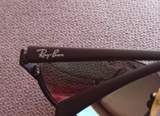 Gafas de sol Ray-Ban negras y verdes
