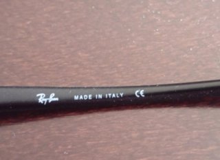 Gafas de sol Ray-Ban negras y verdes
