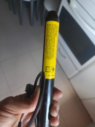 Pretensor cinturón seguridad coche