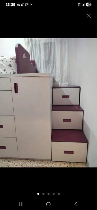 Cama infantil con cajones y tobogán