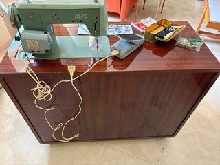 Máquina de coser Alfa 104