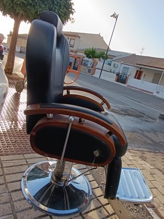 Sillón de barbero poco usado