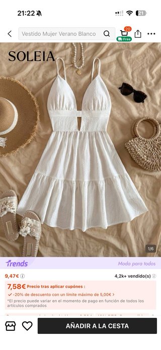 Vestido blanco con escote y volantes