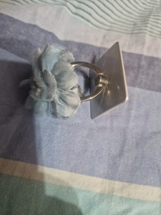 Supporto telefono fiore azzurro