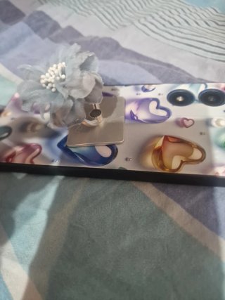 Supporto telefono fiore azzurro