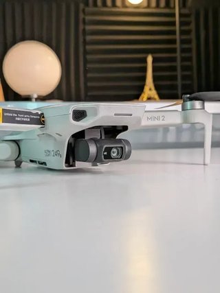 IMPECABLE | DJI Mini 2 Fly More Combo