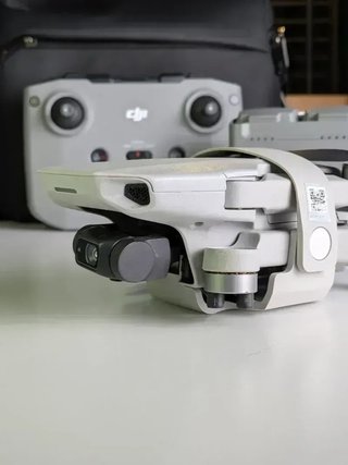 IMPECABLE | DJI Mini 2 Fly More Combo