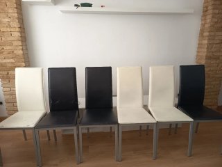Mesa de comedor blanca y cristal negro