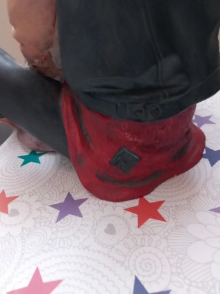 Figura pareja sentada