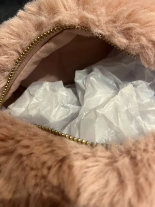 Neceser pelo rosa Stradivarius, poco uso.