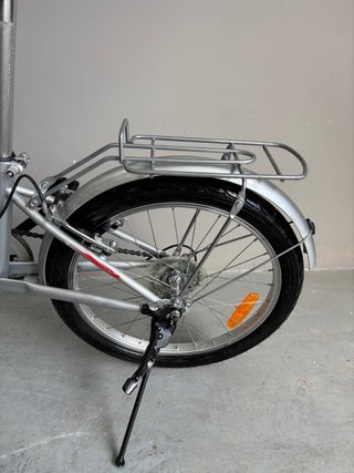 Bicicleta plegable plateada