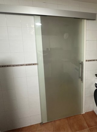 Puerta corredera de cristal