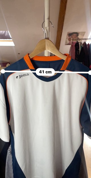 Camiseta Joma azul y blanca