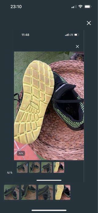 Botas de seguridad negras y verdes