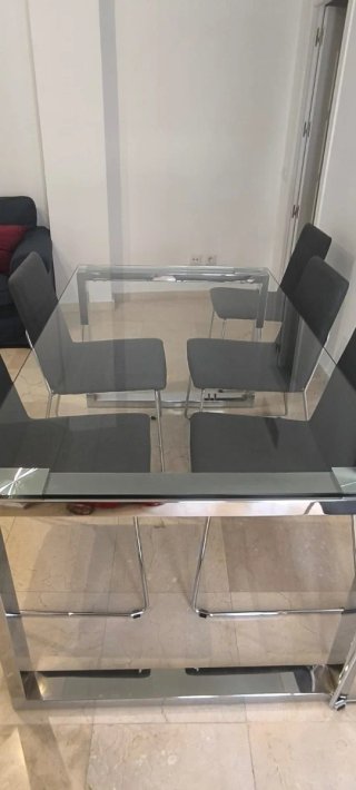 Mesa cristal y metal con 6 sillas